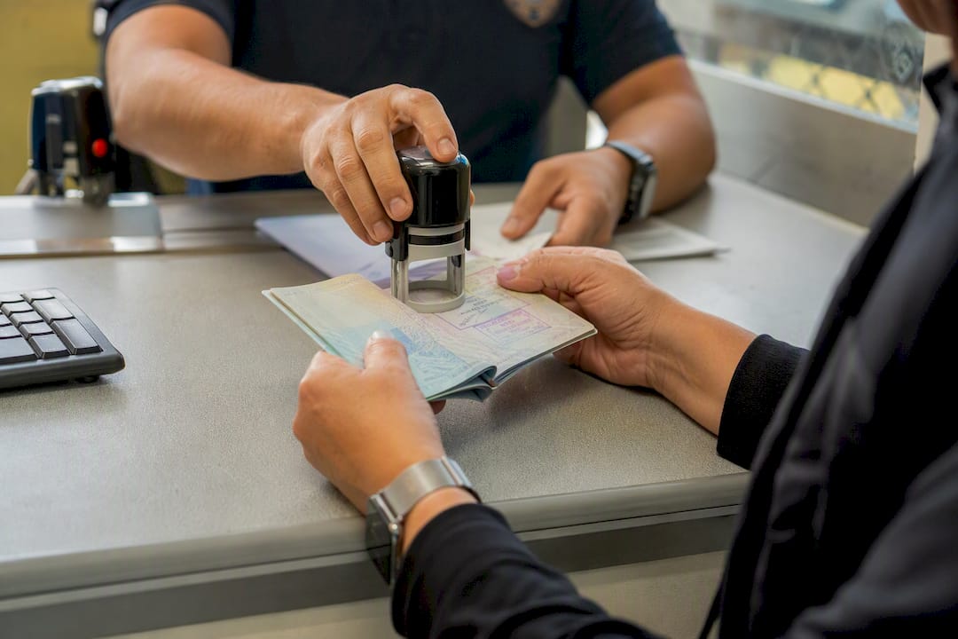 Passport being stamped at Paraguay Brazil border