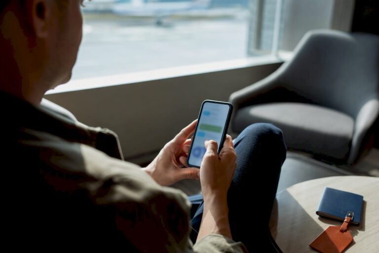 Traveler testing mobile payment before transfer